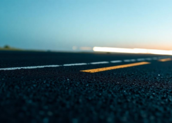 Neural Networks Learn to Trust Their Data: Uncertainty-Weighted AI Predicts Asphalt Density