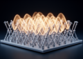 Vibrating metamaterial syncs itself into a single rhythm, like musicians finding the same beat