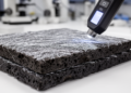 Volcanic rock tiles with carbon fibers and zinc oxide block over 99.999% of electromagnetic waves
