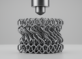 Twisting Metamaterial Turns Compression Into Self-Recovering Impact Protection