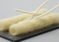 Kapok fibers and xenon fluoride give silicon battery anodes a flexible makeover