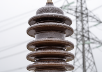 Metal Dust on Power Line Insulators Betrayed by Self-Attention Neural Network