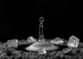 How a Drop of Water Decides Whether Mine Waste Traps Carbon as Flawless Crystal or Useless Crust